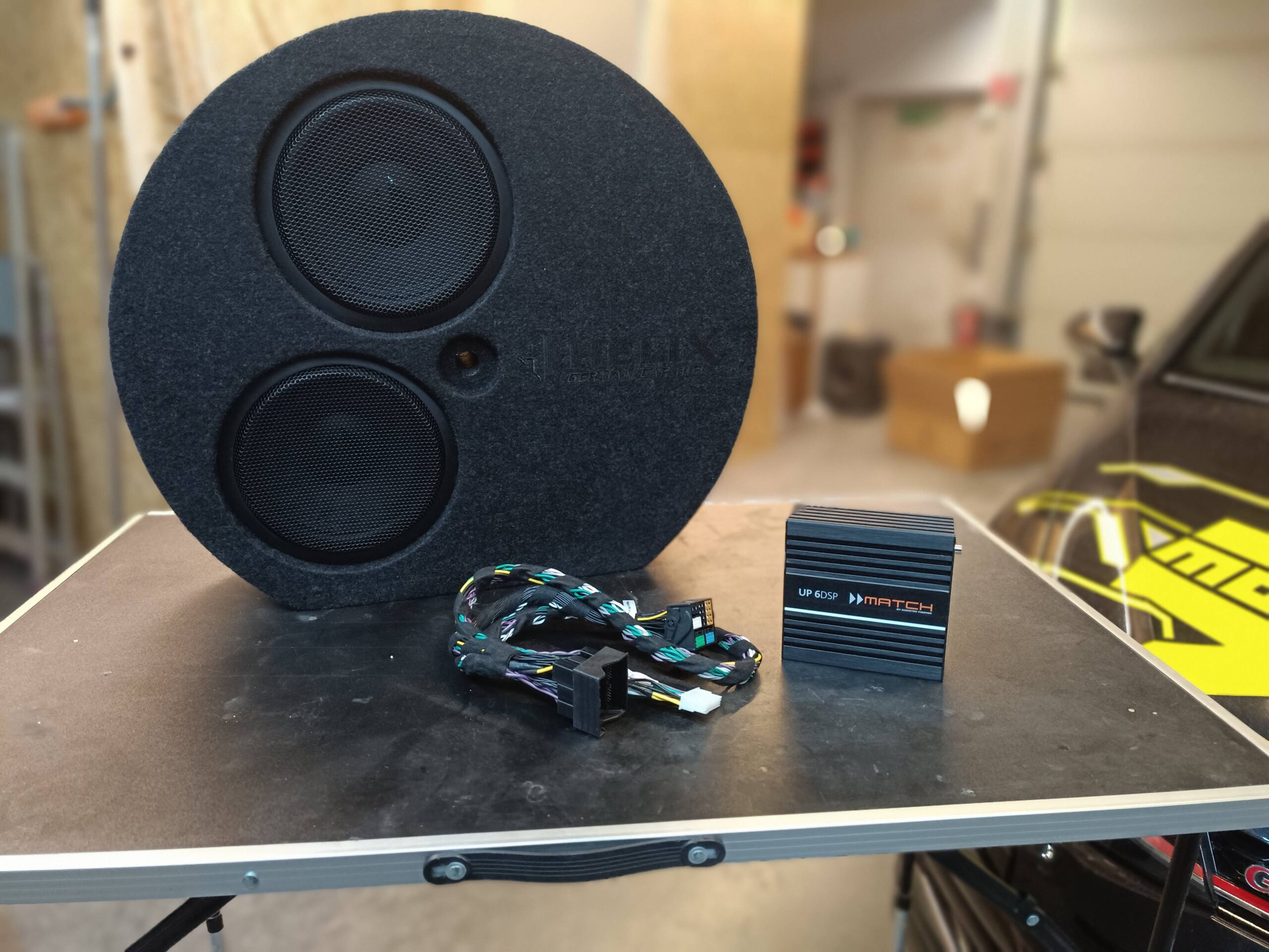 VW Golf 7 GTI Soundupgrade Reserverad Subwoofer