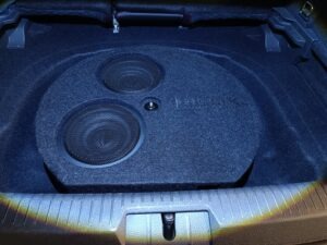 VW Golf 7 GTI Soundupgrade Reserverad Subwoofer